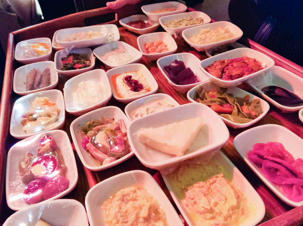 In a restaurant of Istanbul, the waiter brings a large tray of mezes to your table and gladly explains what they contain. 